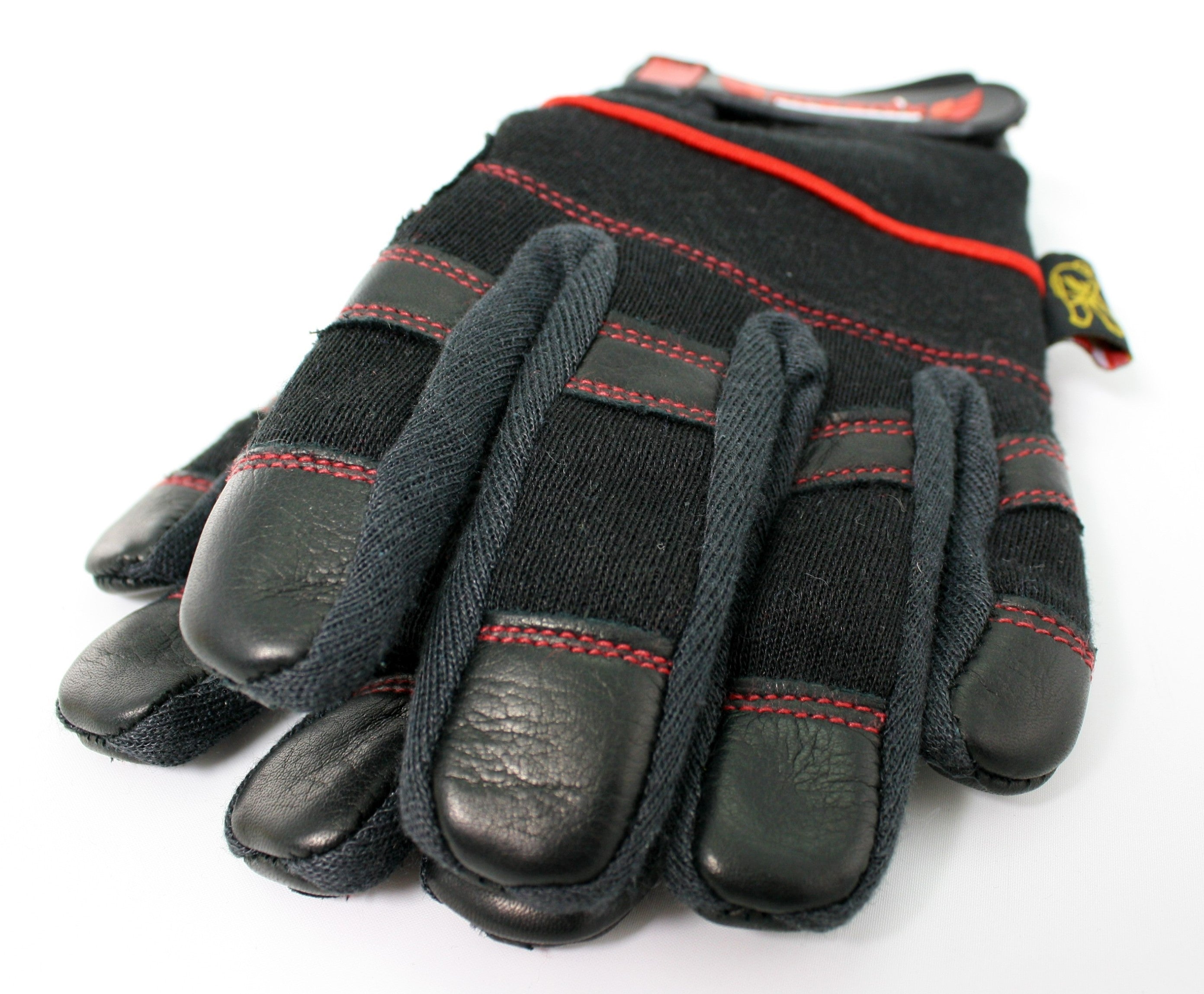 A pair of Phoenix gloves, one on top of the other, both palms down. Close up of the fingertips.