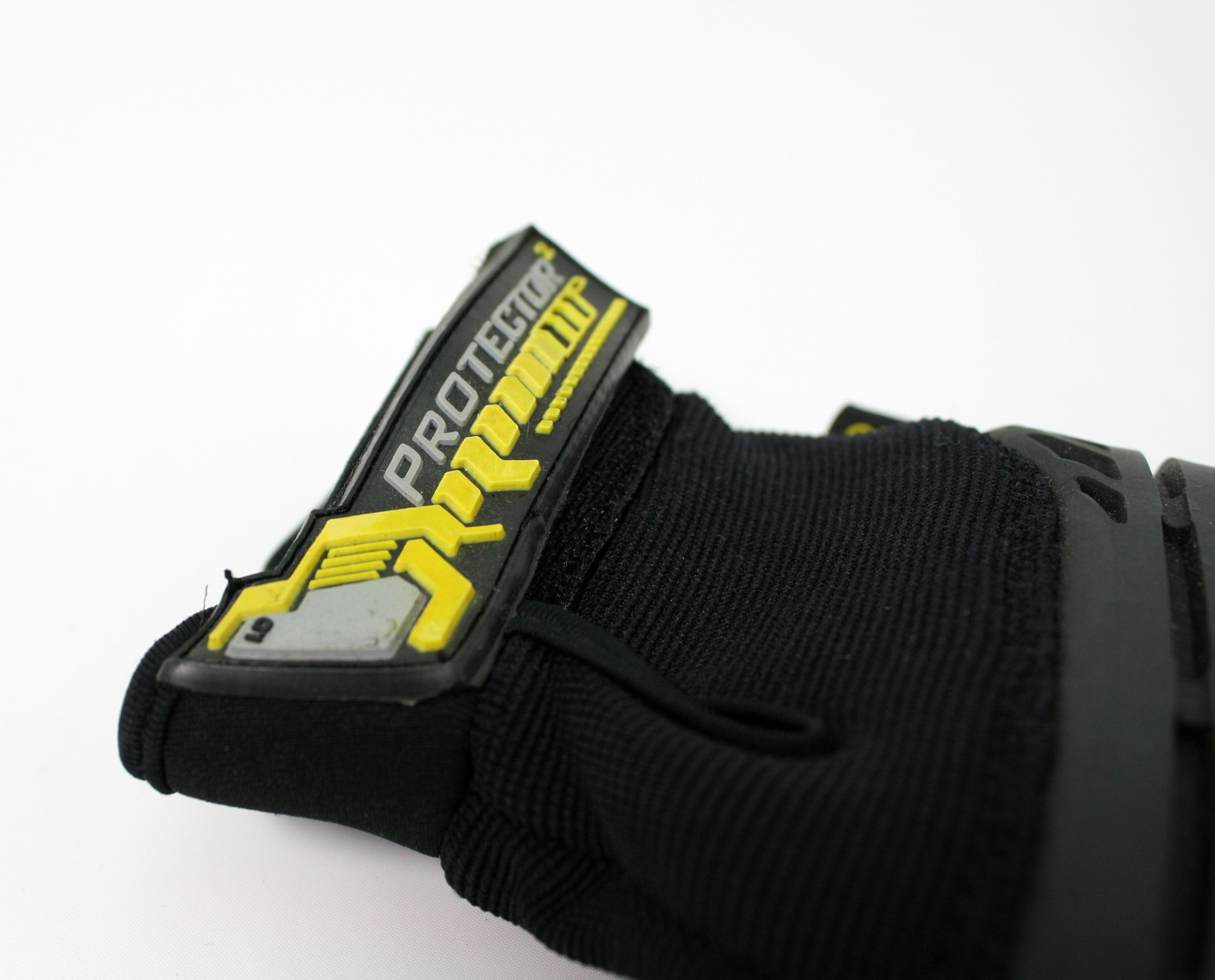 A close up of the Protector logo at the cuff of the glove