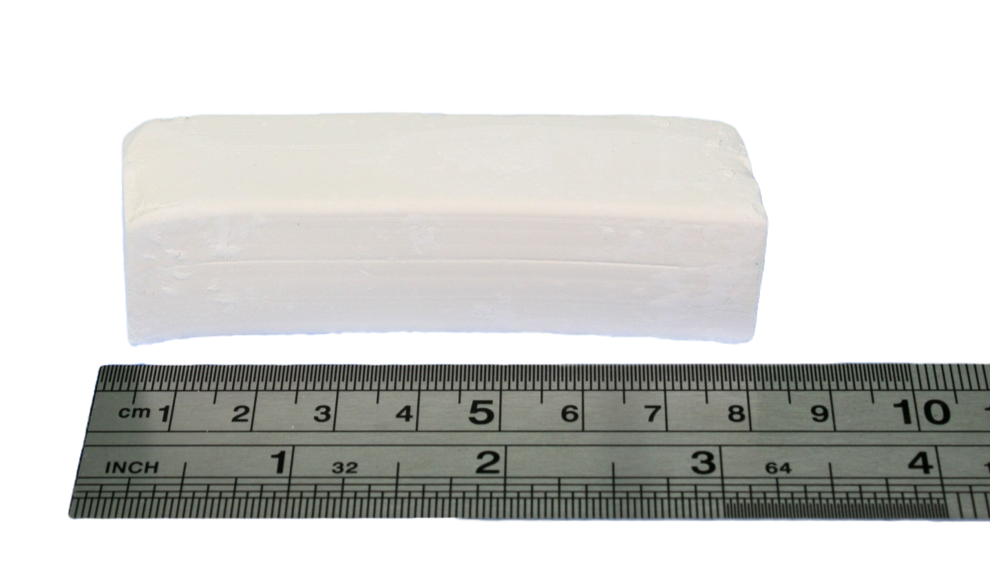 A piece of chalk next to a ruler, showing the total length to be just over 8cm