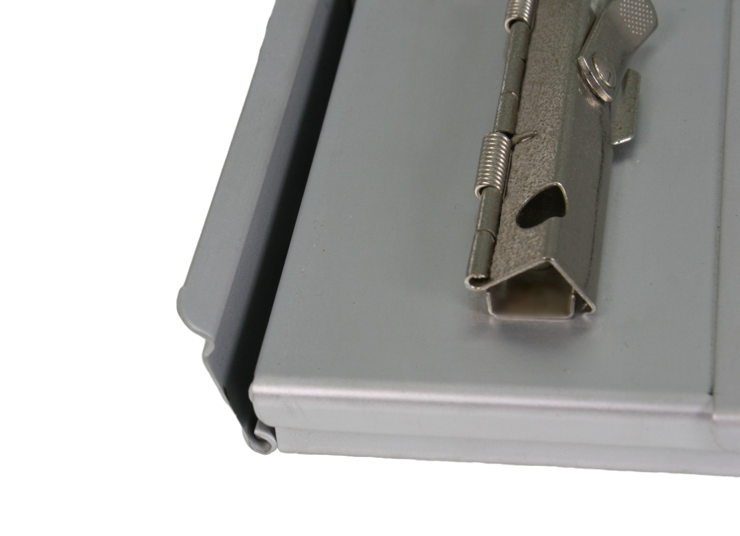 A close up of the hinges and clips at the top, with the lid of the rear compartment slightly open