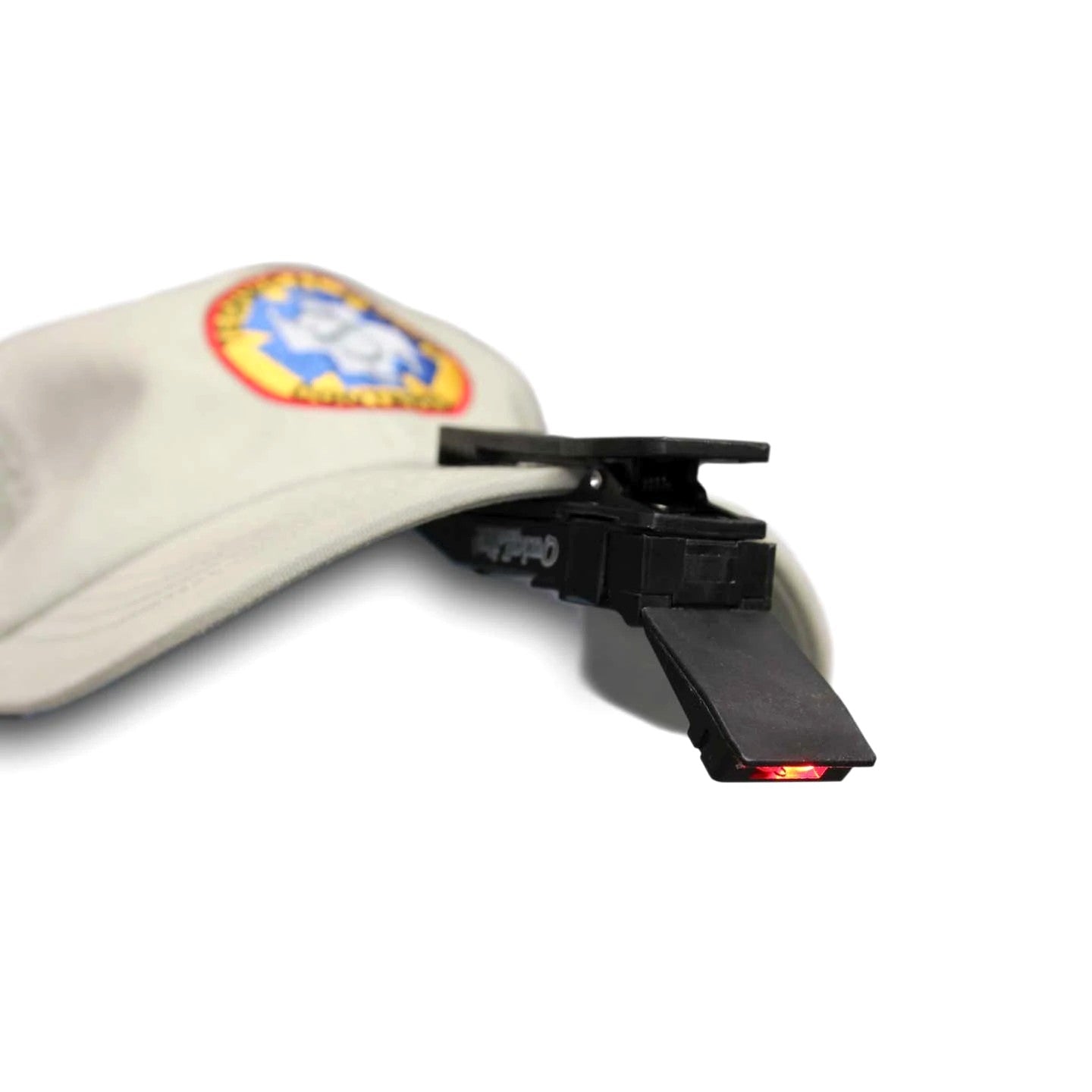 Quiqlite light attached to the cap of a hat