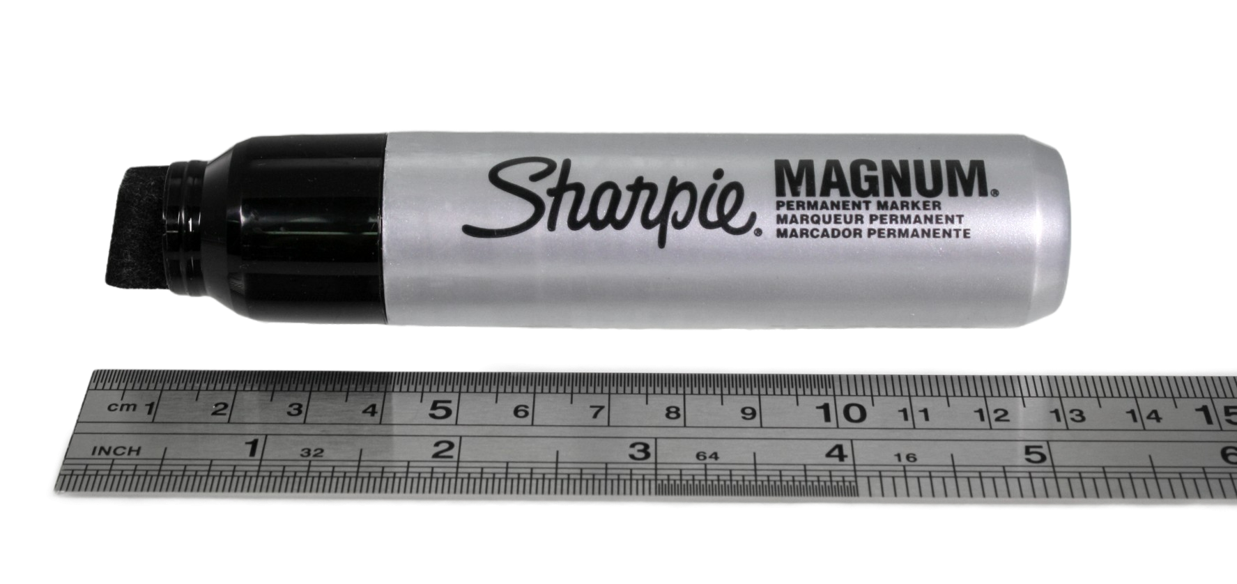 Magnum marker, lid off, next to a ruler showing that the total length is just over 13cm