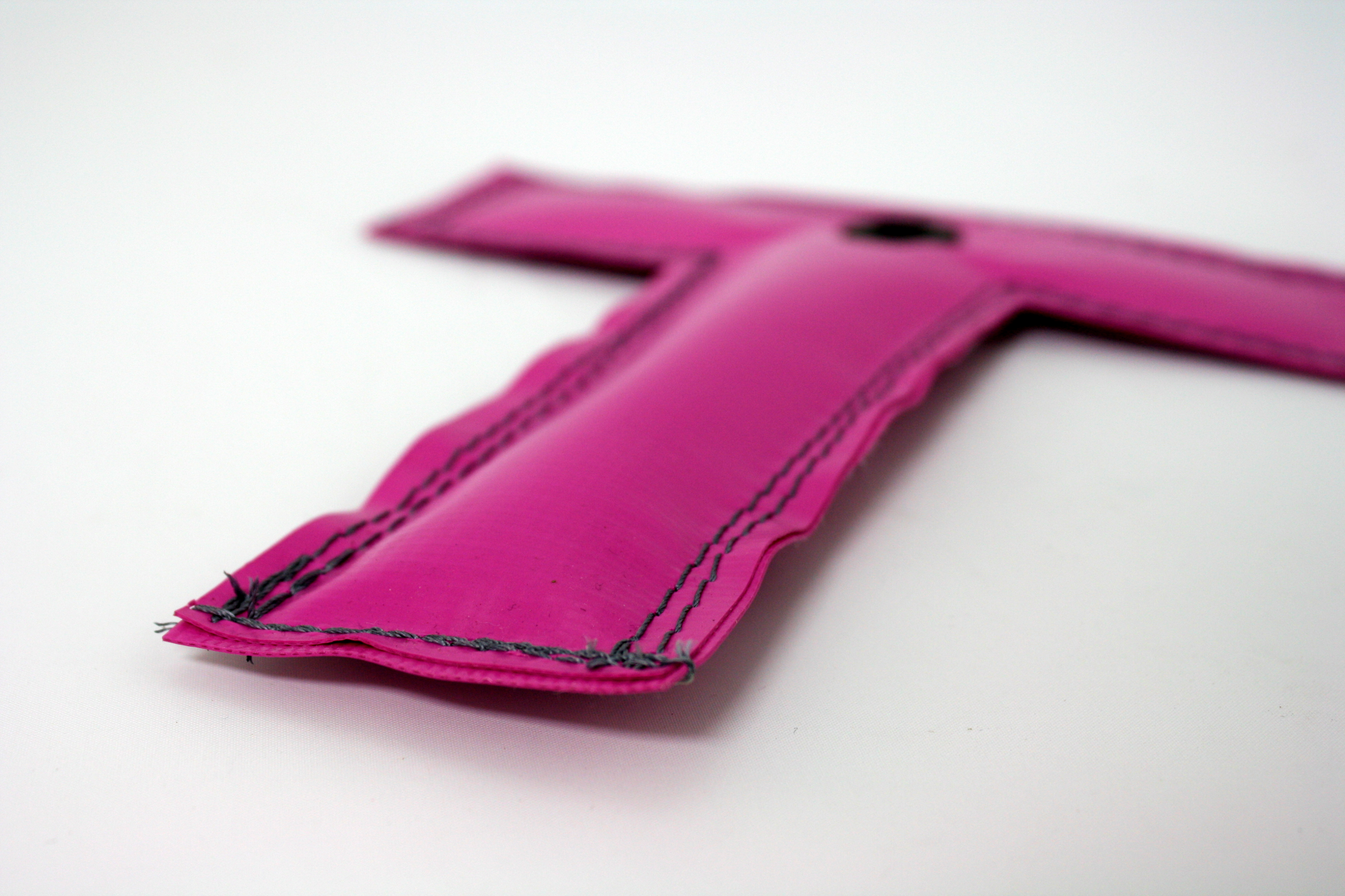 Pink PVC T-Mark, close up