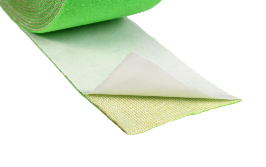 A close up of a strip of tape, with part of the backing peeled away to show the adhesive underside of the tape