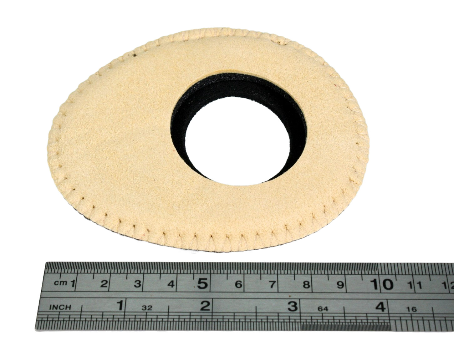 Oval Large Eye Chamois next to a ruler showing that the longest part is just under 10cm