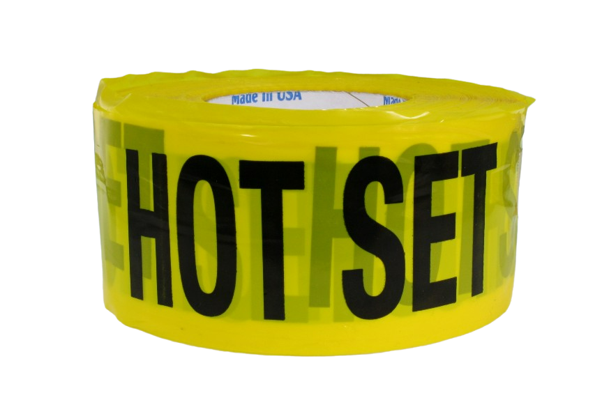 A roll of tape, showing the words 'HOT SET' with many layers behind