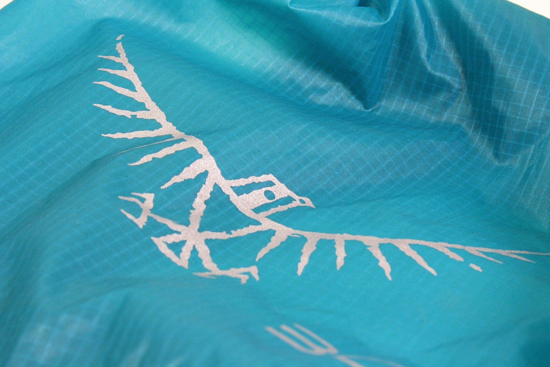 Close up of the fabric and logo