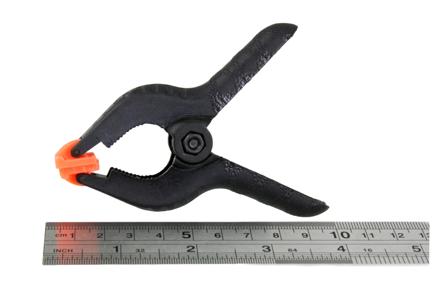 25mm spring clamp, next to a ruler, showing the total length to be just under 10cm