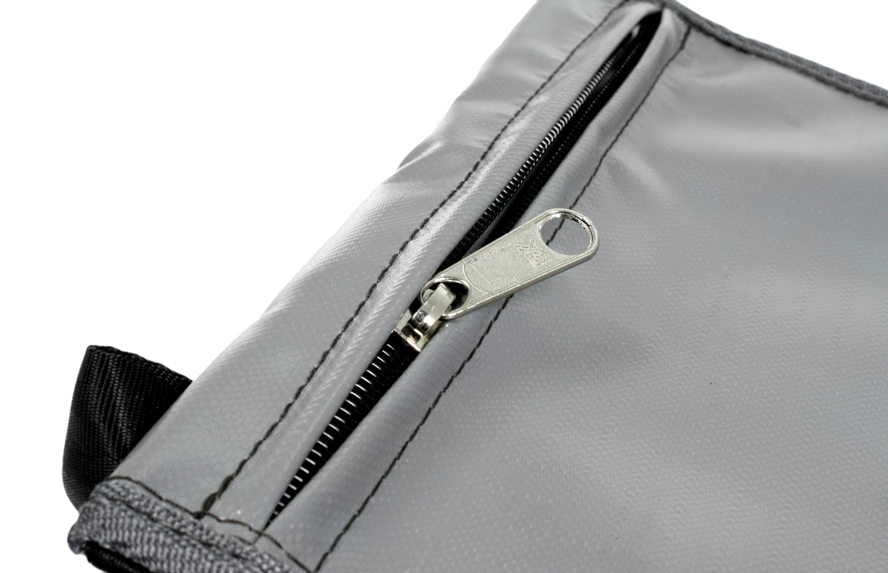 Close up of the sizp detail on a grey PVC refillable sandbag