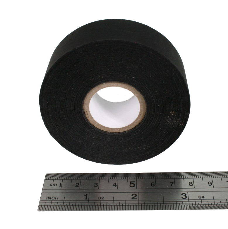 A close up of a 1" small core roll next to a ruler, showing that the widest part of the roll is approximately 8cm