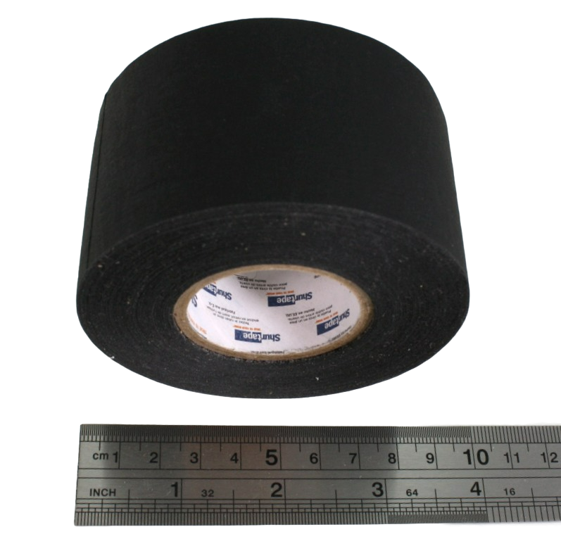 A close up of a 2" small core roll next to a ruler, showing that the widest part of the roll is approximately 10cm