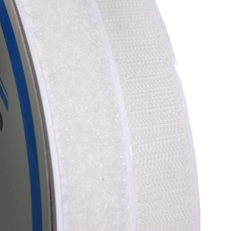A close up of the 1" white hook and loop tapes, showing the texture of each