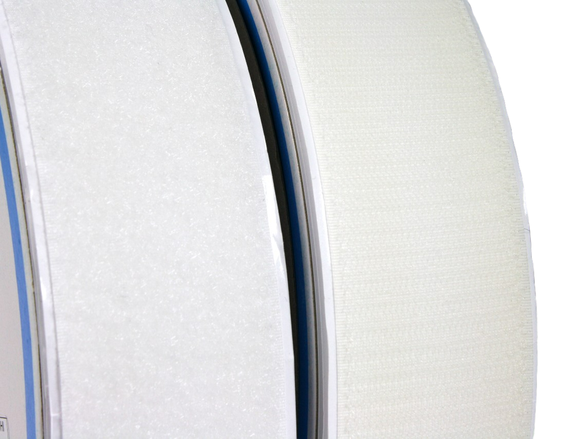A close up of the 2" white hook and loop tapes, showing the texture of each