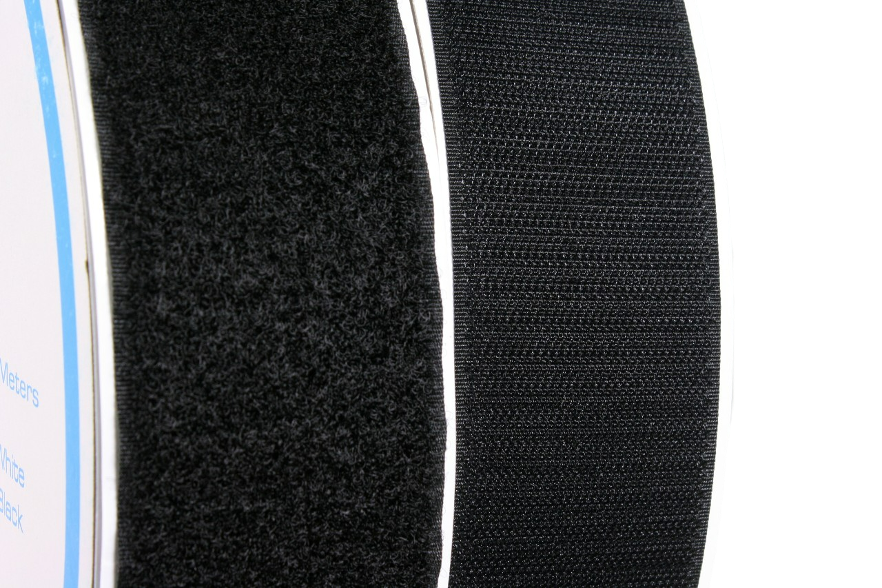 A close up of the 2" black hook and loop tapes, showing the texture of each
