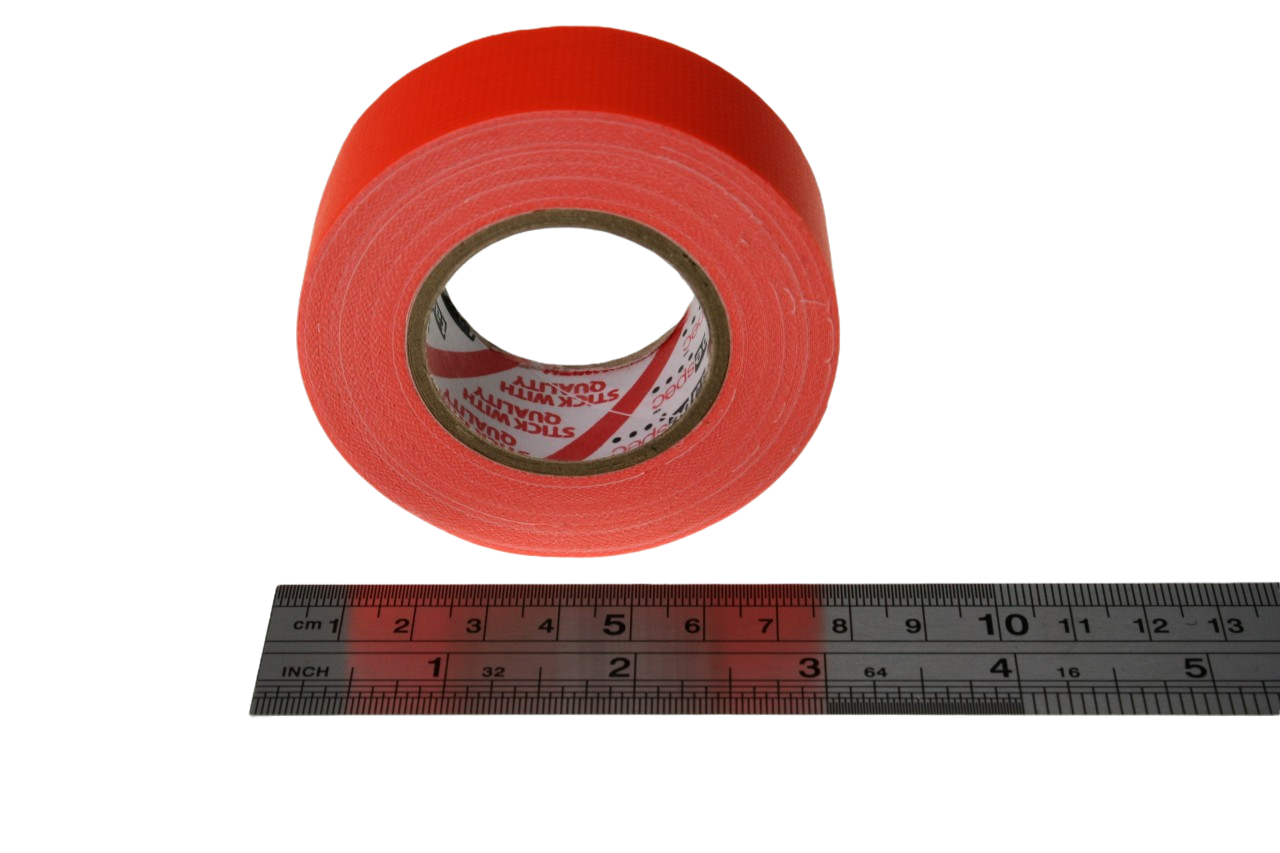 A close up of a roll of TapeSpec small core tape in fluro orange next to a ruler. The image shows that the widest part of the roll is just under 8cm